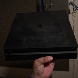 PS4 With Plug In And HDMI Cord 