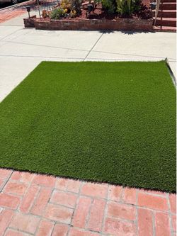 Artificial turf piece