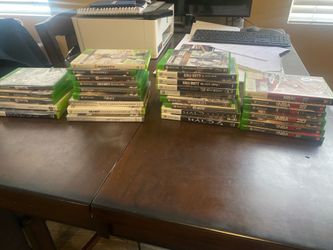 30 pre-owned X-Box Games