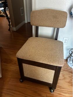 Chair/storage. with wheels.