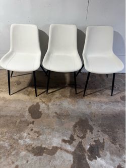 white faux leather dining chairs