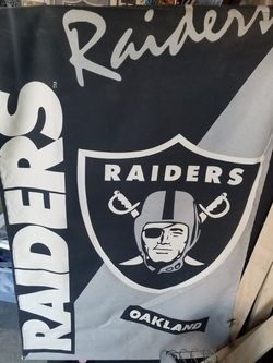 Oakland Raiders banner and seat cushion
