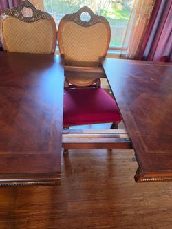 Dinning table with six chairs with extending board