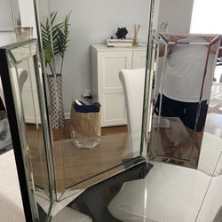 Three vanity mirrors