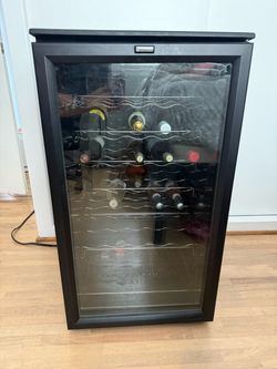 Wine fridge: Holds 30 bottles