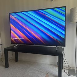 TCL 55in Roku 4k Smart TV With Ikea Stand