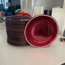 Red charger plates with rhinestone trimming