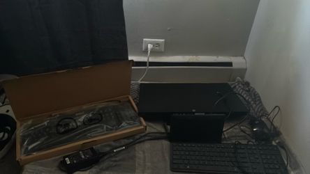 Selling an HP monitor with 2 keyboards (one new one used) and a mouse also