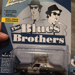 Johnny Lightning "Pop Culture" series die-cast replica of the 1974 Dodge Monaco "Bluesmobile" from the film The Blues Brothers. 