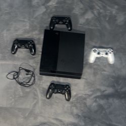 Playstation 4 & Four Ps4 controllers with a charger (negotiable need gone)