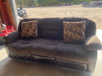 Dark Brown Reclining Sofa with Throw Pillows