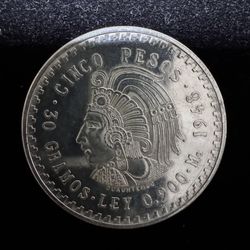 1948 .900 silver, Mexico 5 Paso coin.
