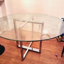 CB2 glass top table with stainless legs (47inch diameter)