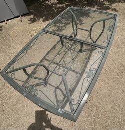 GLASS PATIO TABLE 66 X 40 X 27 47TH AVE. AND DOBBINS IN LAVEEN