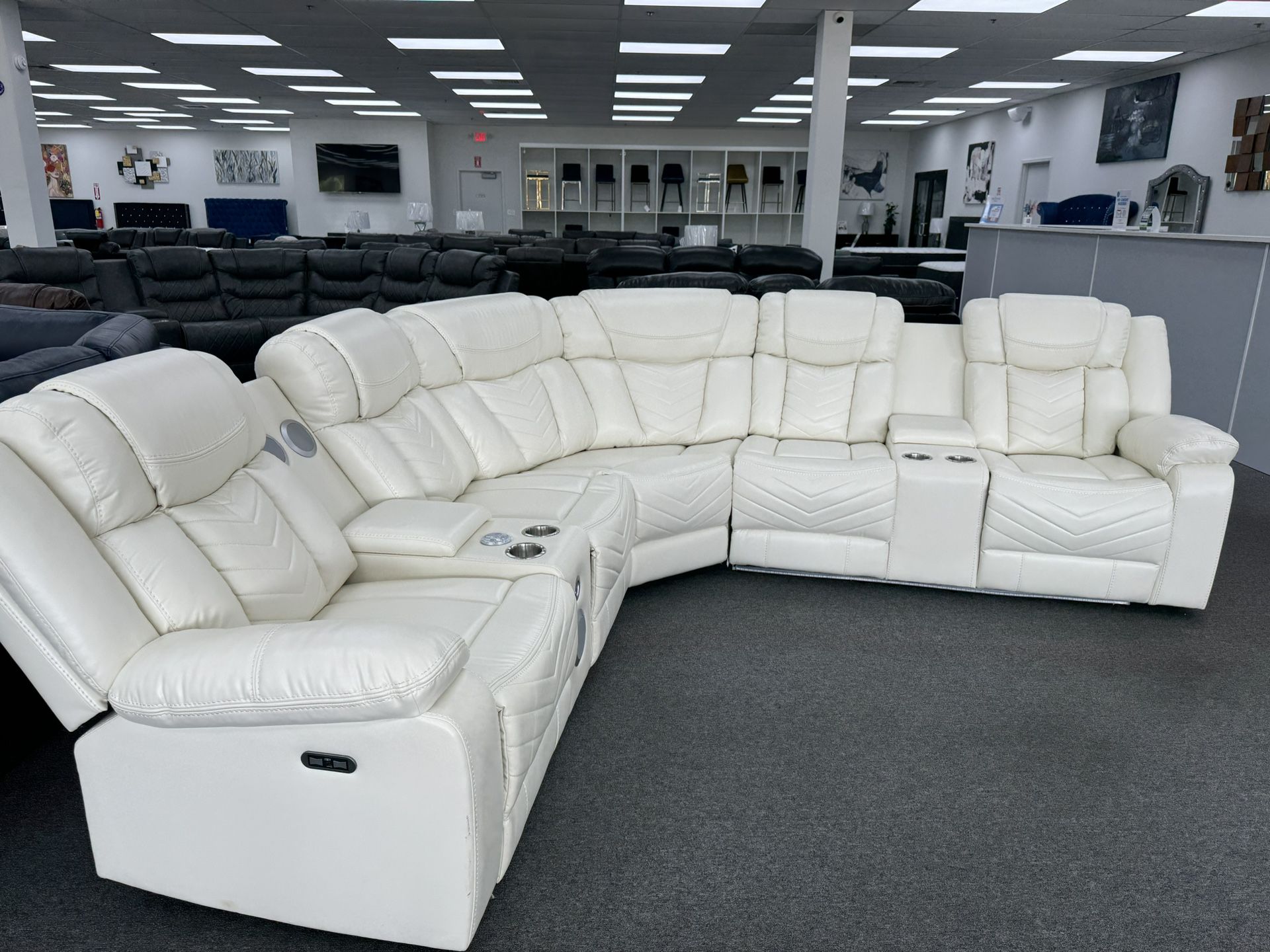Deluxe Power Reclining Sectional with Built-In Speakers and Amenities