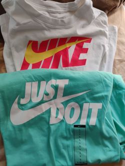 Size large and medium Nike T-shirts white and aqua green