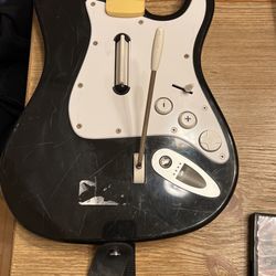 Guitar Hero Guitar For The Wii It’s Kinda Scratched Up But In Good Working Condition!