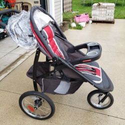 Graco FastAction Fold Jogger Travel System | Includes the FastAction Fold Jogging Stroller and SnugRide 35 Infant Car Seat, Gotham