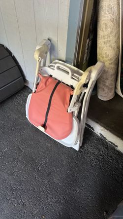 Pink collapsible high chair