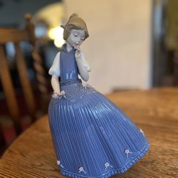 Lladro - Girl In Blue Dress With Flowers 11 1/2"h by 8" wide 