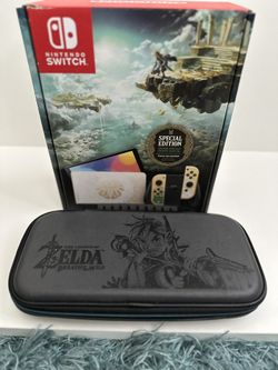 Nintendo Switch OLED Zeld Edition And Two Games
