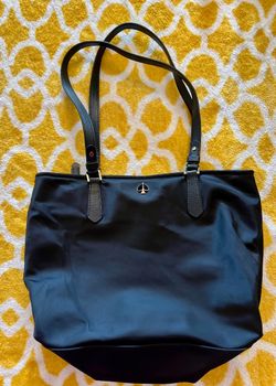 kate spade black tote with leather straps and gold spade logo