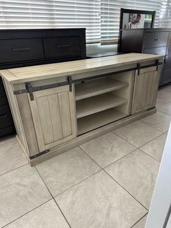 Ashley Farmhouse Tv Stand in good condition