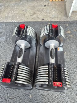 Pair of adjustable dumbbells 50lbs each