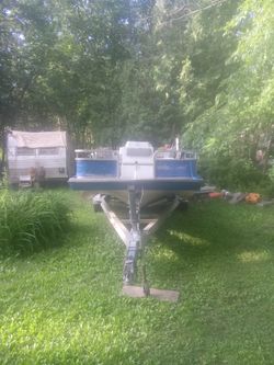 Hurricane deck boat and trailer