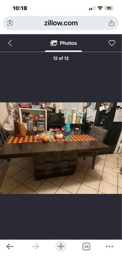 Table and 6 chairs with a center leaf