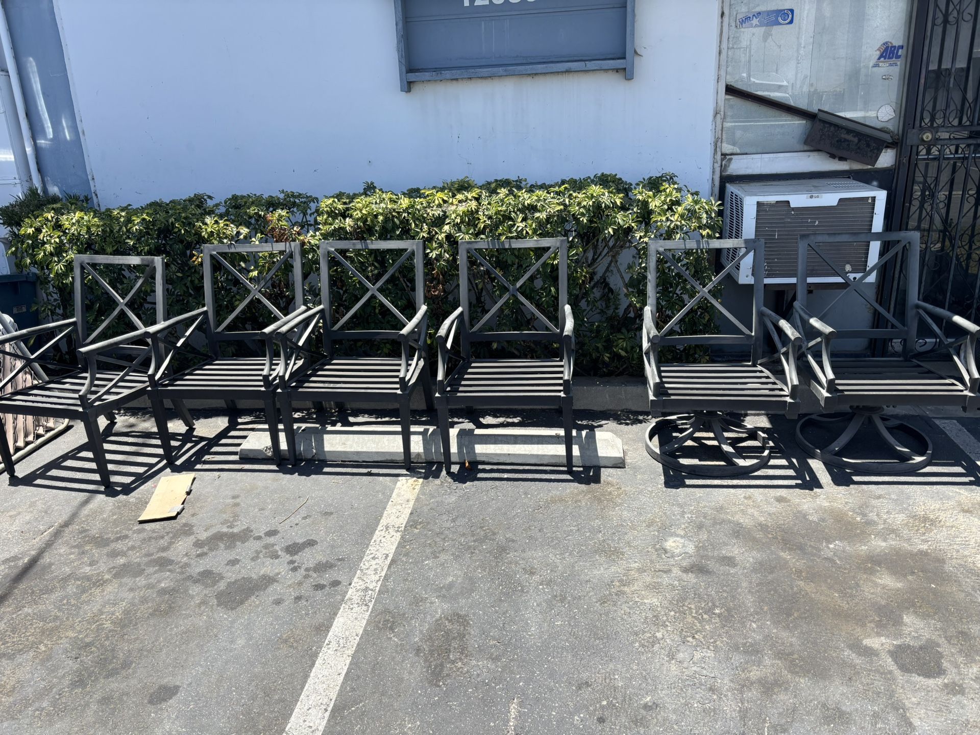 Six patio chairs, no cushions