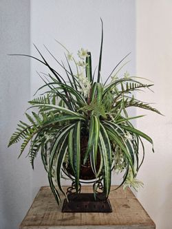 Fern and flower decorative arrangement
