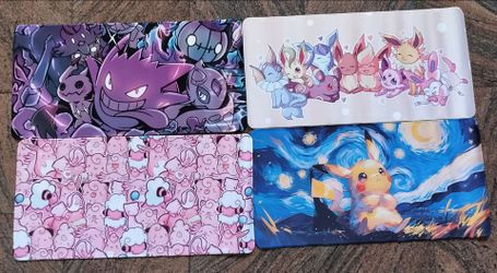 Gengar, Eeveelutions, Mew, and Pikachu Playmats