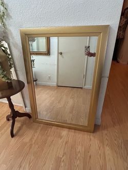 Gold mirror