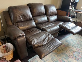 Ashley brown leather sofa 6ft 4inches long