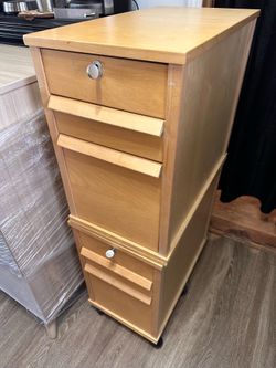 2 wood file cabinets