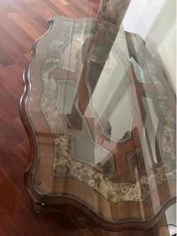 Beautiful Michael Amini dinning table set and a coffee table