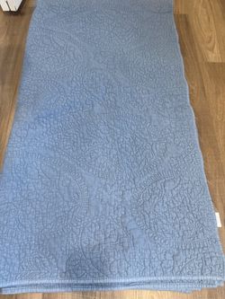 Full size never used light blue quilt