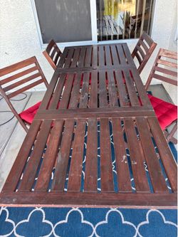 IKEA Table and 4 Chairs with 2 folding leaves