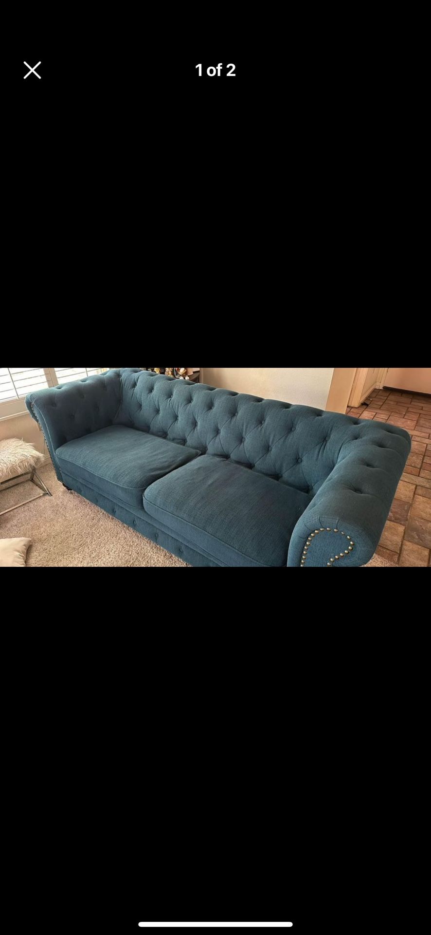 2 blue couches 