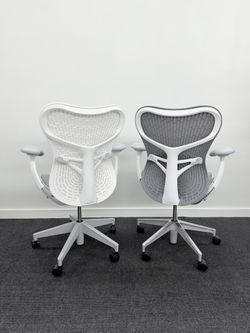 HERMAN MILLER MIRRA 2 CHAIRS IN LIKE NEW CONDITION BOTH CHAIRS HAVE LUMBAR SUPPORT 