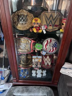 We championship belts and figurines