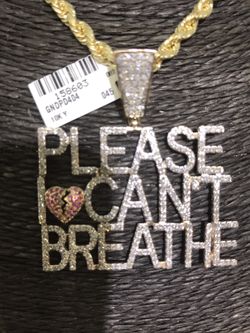 10k gold with 2.25 ctw diamond charm and solid rope chain 38.5 grams