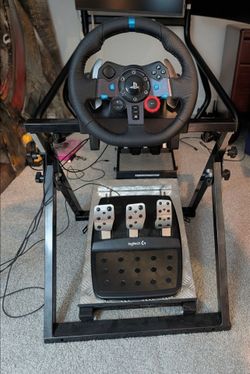 Logitech G29 Racing setup mounted on a next level racing stand