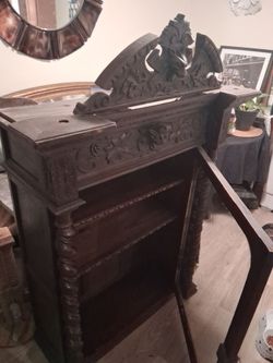 Antique Renaissance Revival hunt cabinet