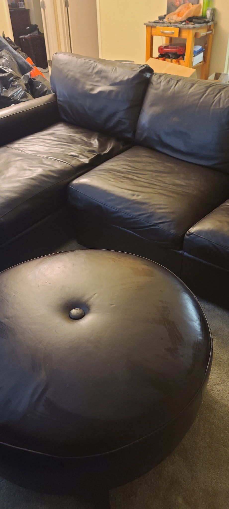 Leather Sofa And Ottoman Used In Good Condition