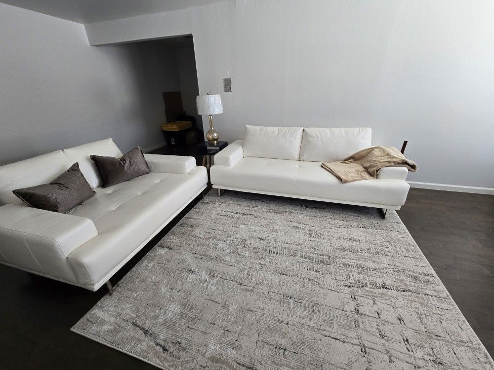 White Faux Leather Sofa and Loveseat with Chrome Metal Legs