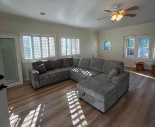XL sectional sofa with pull-out & double storage grey corduroy