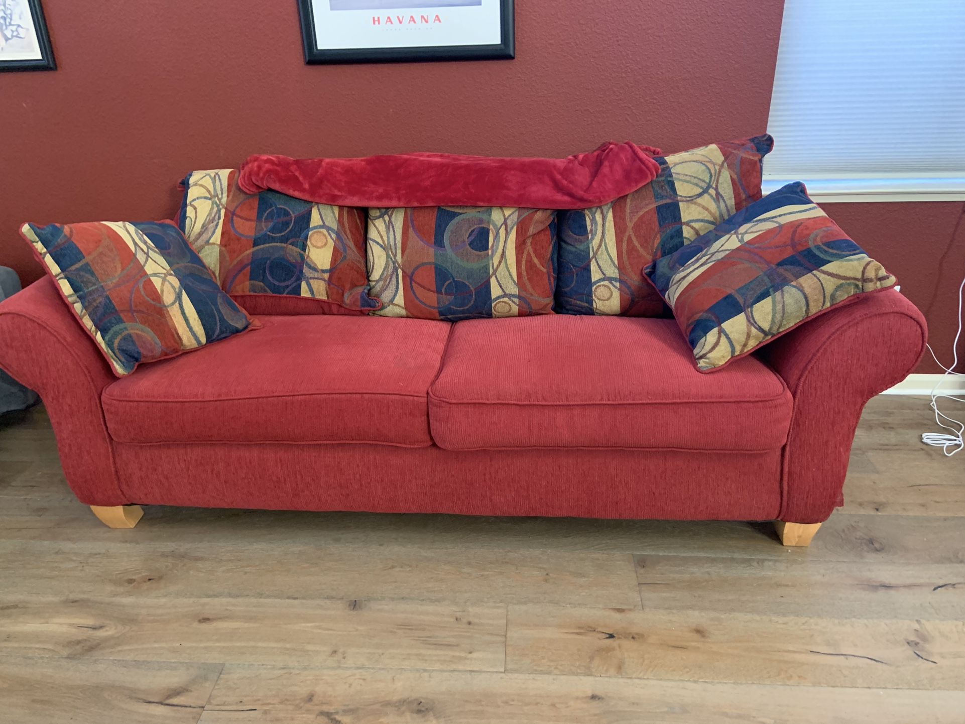 Red couch & Yellow Complimentary Chairs
