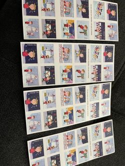 Charlie Brown 2015 forever stamps ( 4 books)